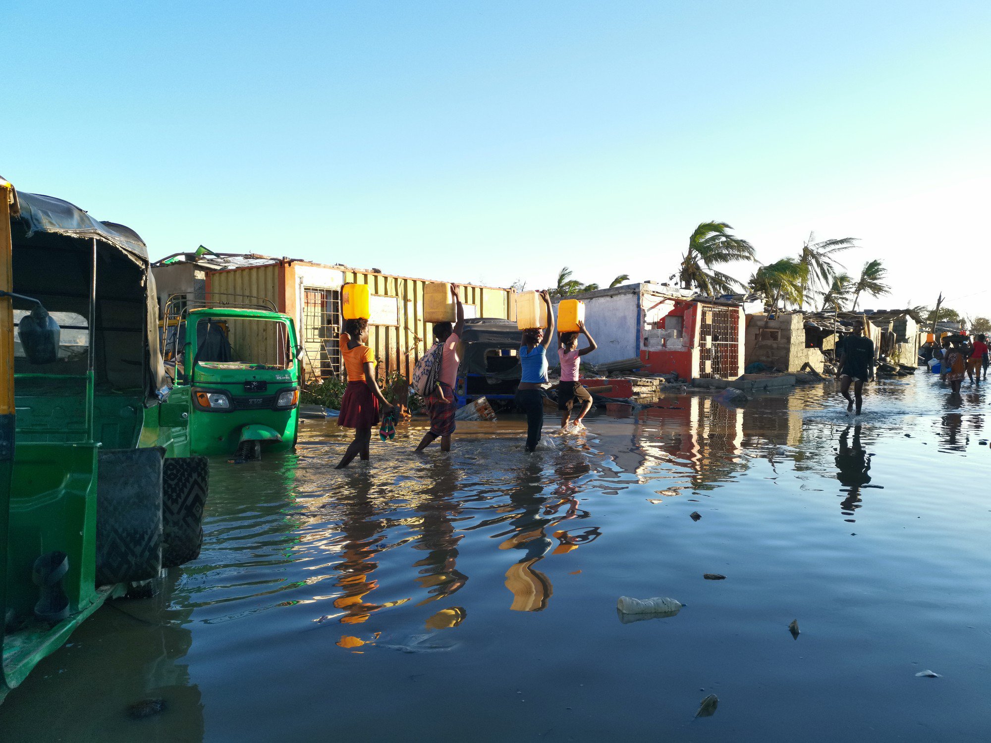  Flood survivors in Mozambique wading in water 