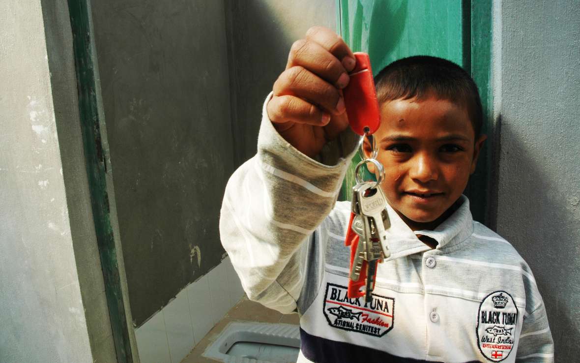 80106lpr boy with keys to toilet.jpg