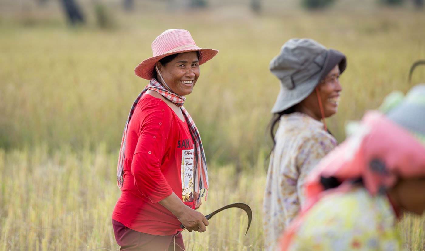 Cambodia rice coop woman president in field IMG_7231 web.jpg