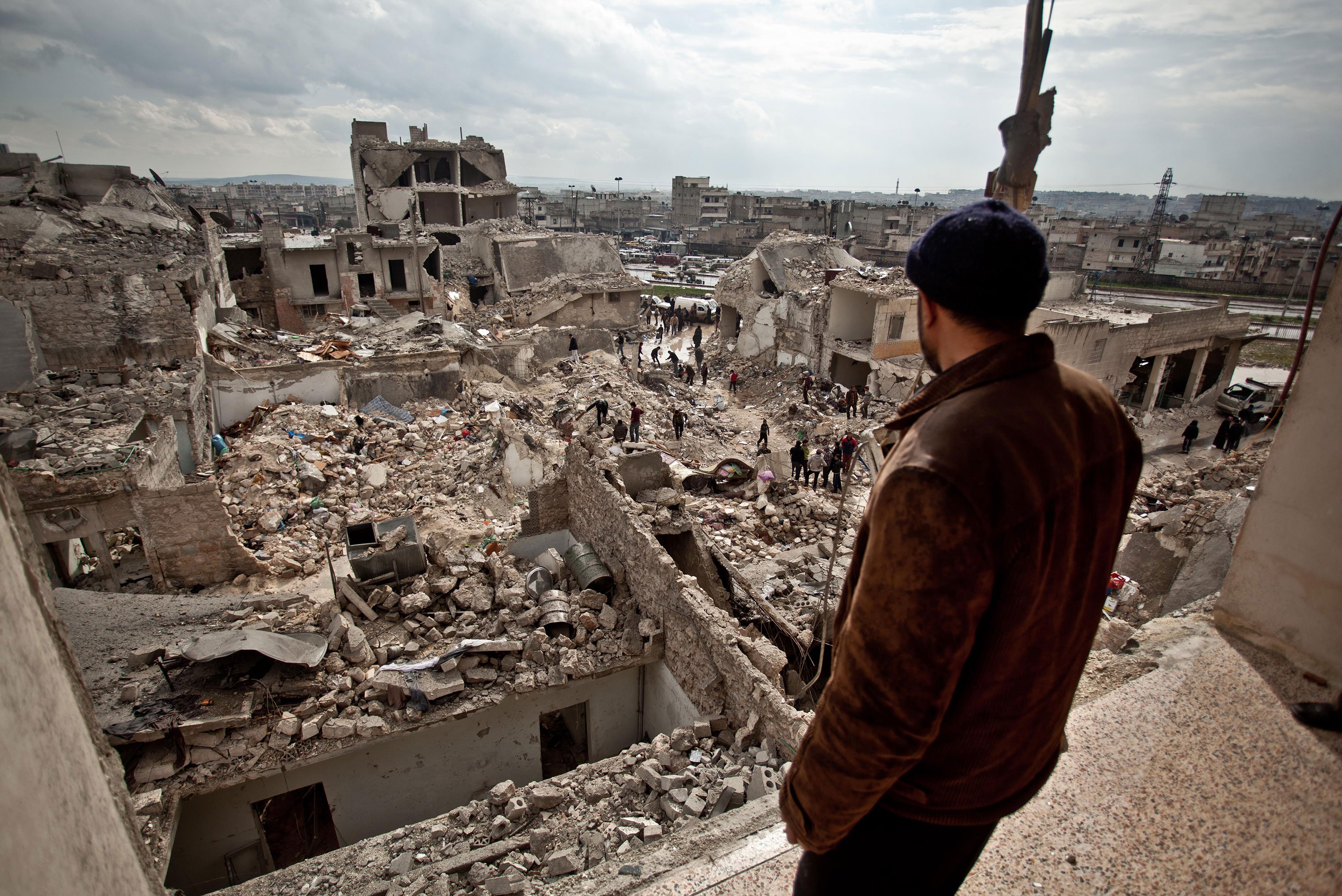 The view over Aleppo, Syria, shows a neighborhood destroyed by war. The conflict there has displaced 11 million people.