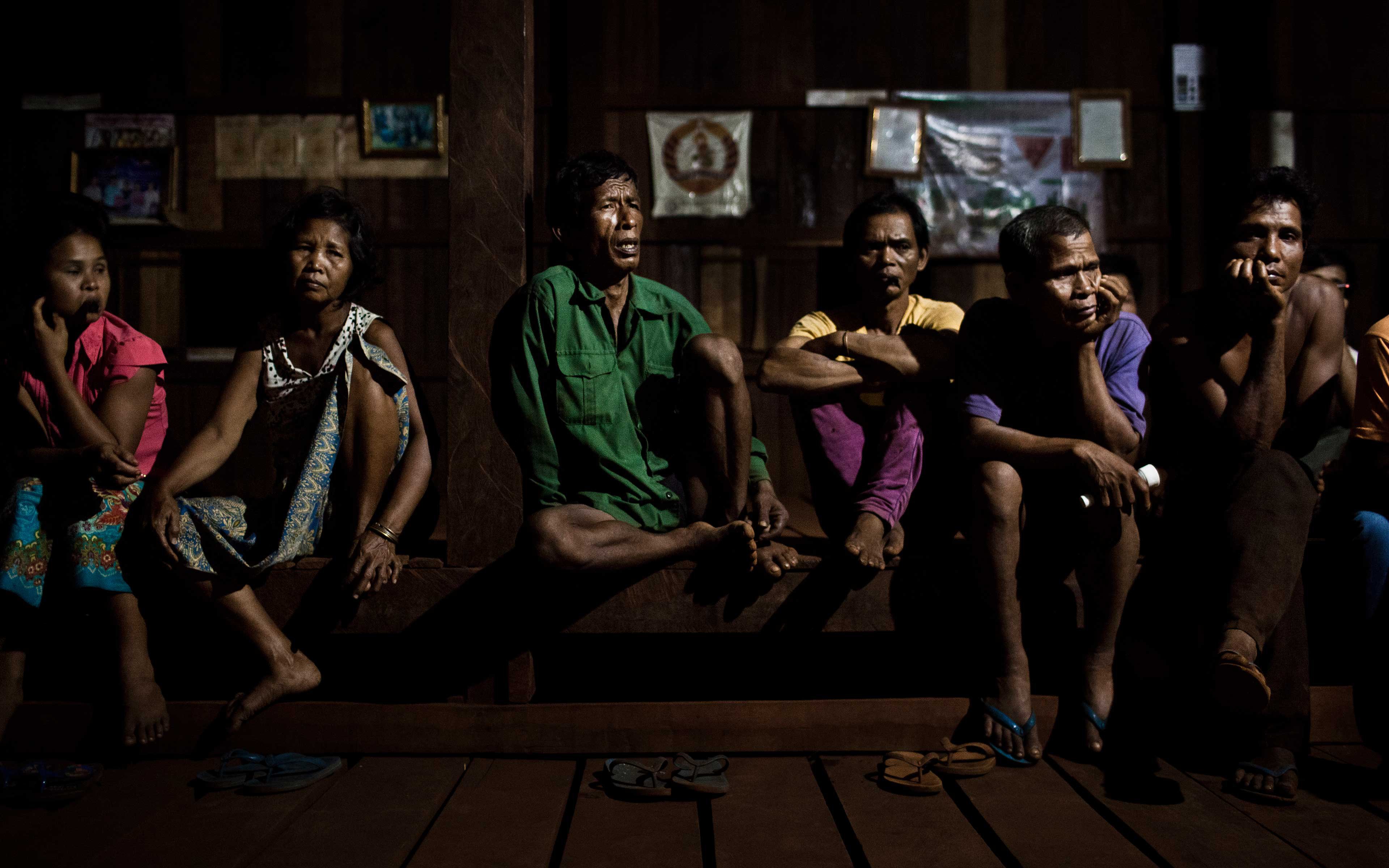 The night before negotiations with government officials and representatives of a Vietnamese company, members of the indigenous community of Kanat Thom, Cambodia, gather to prepare. These indigenous Kachok people are involved in a struggle to defend their communal lands from international investors intent on clearing their forest and agricultural fields to grow rubber trees.