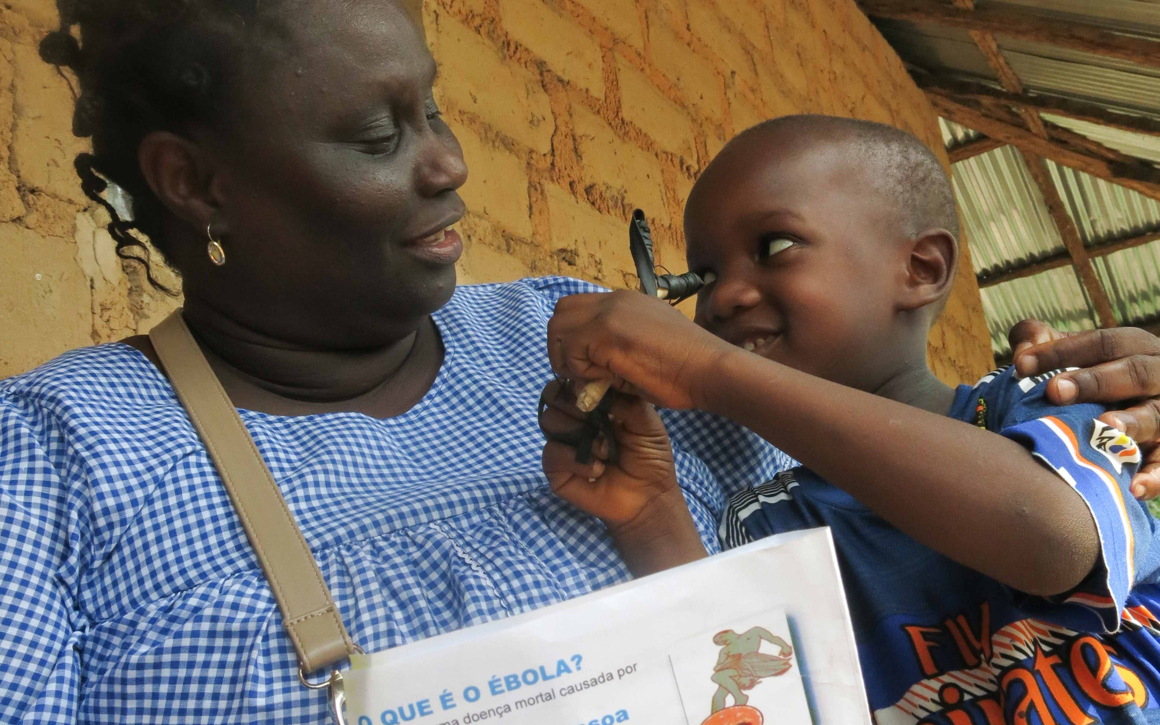 During the Ebola outbreak in West Africa, nurse Maria Cardoso walked from door to door sharing information on how to prevent the disease. She works for the Association of Women Workers, a local partner of Oxfam partner NADEL in Guinea-Bissau.