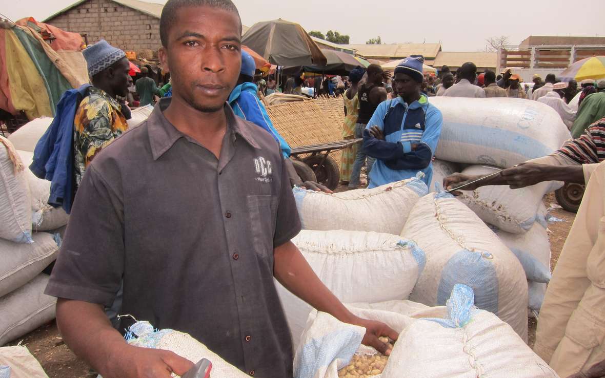 man-in-kolda-with-sacks-of-grain-senegal-march-8-2012