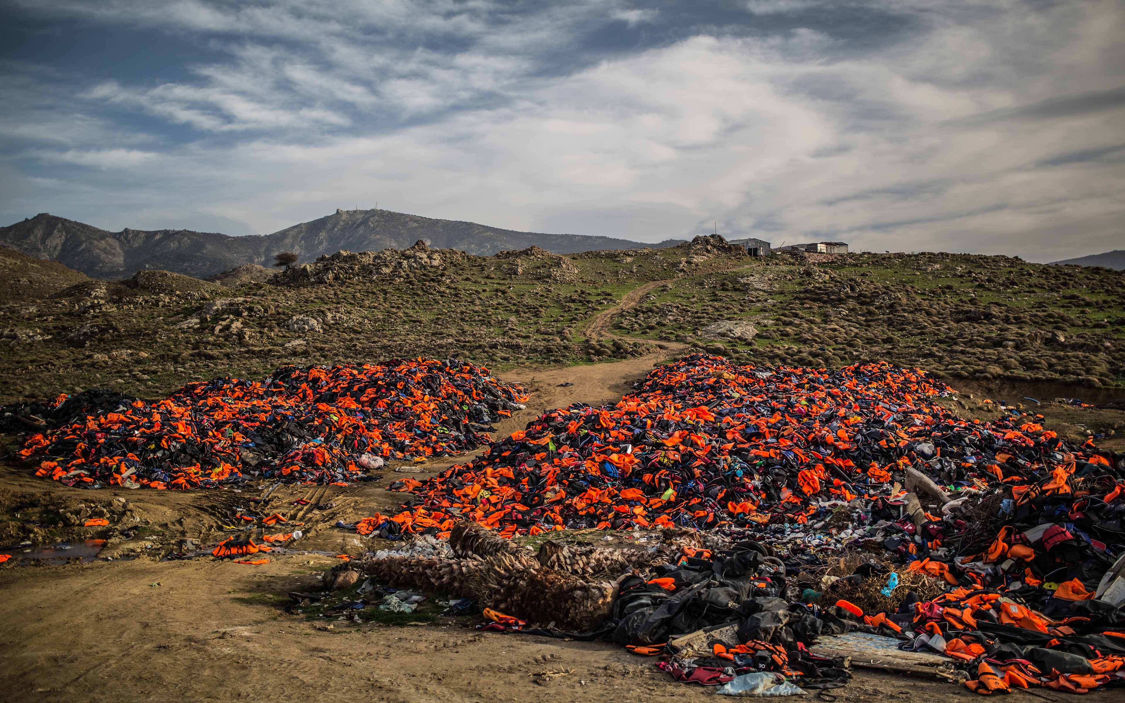 A small mountain of lifejackets lie on the Greek island of Lesbos. In February, 2016, as many as 50 boats a day crowded with refugees were
landing on the shores here.