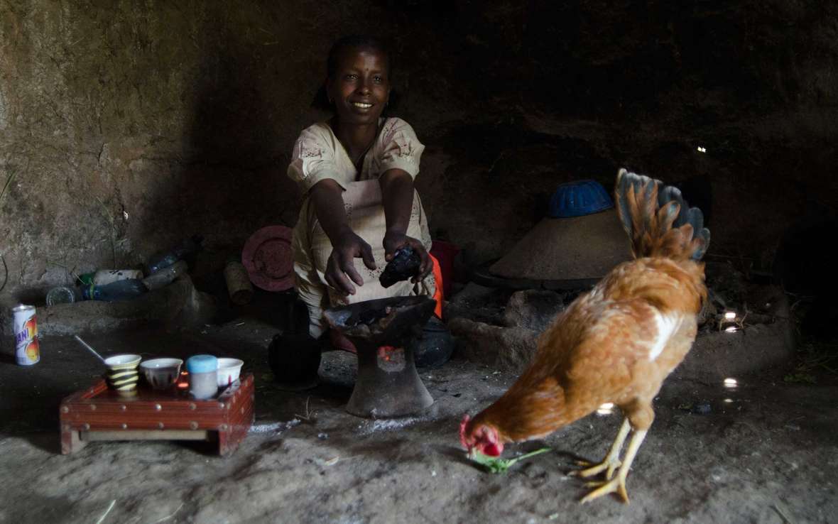 woman-home-chicken-ethiopia-ous-48794.jpg