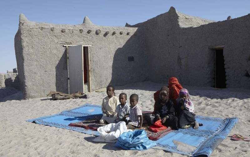 woman-in-red-shawl-chad-10-february-2012